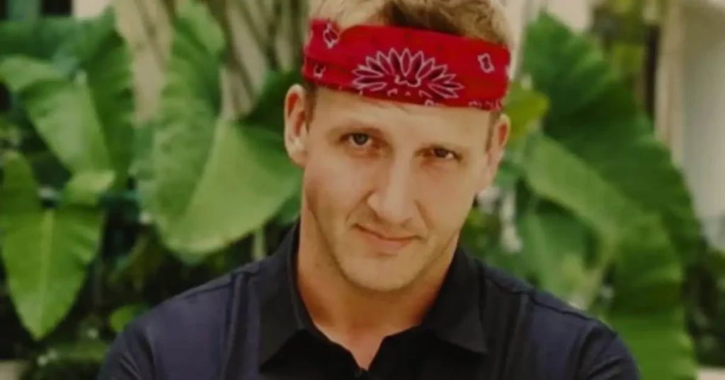 Will Sonbuchner, a man with a bandana on his head, presents a fashionable and confident appearance.